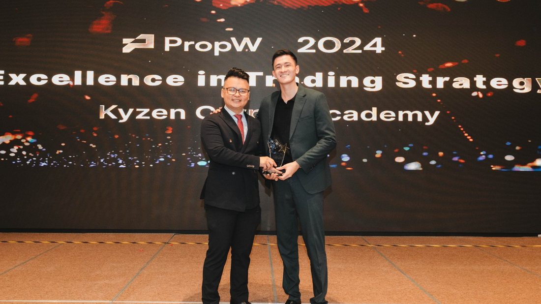 Kyle receiving the PropW 2025 Excellence in Trading Strategy award